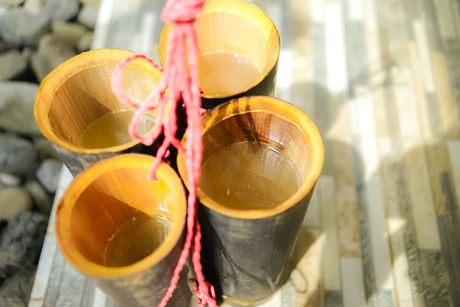 Fresh coconut sap in bamboo container
